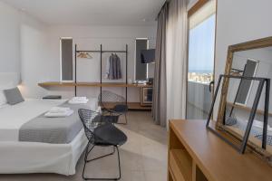 Posteľ alebo postele v izbe v ubytovaní Basilico Suites Adults Only by Estia
