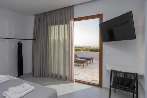 Posteľ alebo postele v izbe v ubytovaní Basilico Suites Adults Only by Estia
