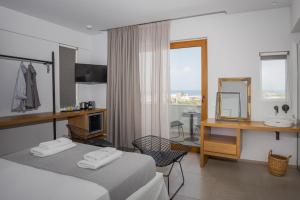 Posteľ alebo postele v izbe v ubytovaní Basilico Suites Adults Only by Estia