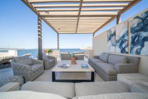 Posezení v ubytování 1 Homes Preview Cabo