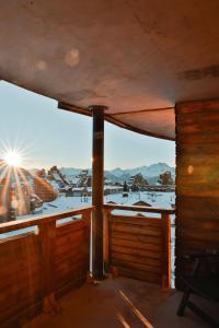 a view of a snowy mountain from a window at IMMODREAMS - L'Igloo - Avoriaz in Avoriaz