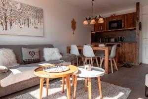 Kuchyň nebo kuchyňský kout v ubytování IMMODREAMS - La Marmotte - Avoriaz