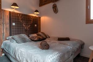 Postel nebo postele na pokoji v ubytování IMMODREAMS - La Marmotte - Avoriaz