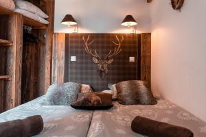 Postel nebo postele na pokoji v ubytování IMMODREAMS - La Marmotte - Avoriaz