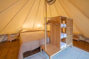 Postel nebo postele na pokoji v ubytování Riva di Ugento Beach Camping Resort + 37 fotografií