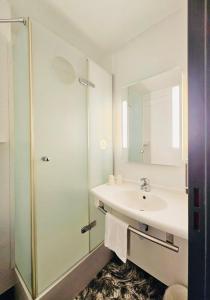 Koupelna v ubytování B&B HOTEL Montpellier Sud Lattes