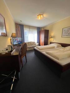 Postel nebo postele na pokoji v ubytování Central Hotel