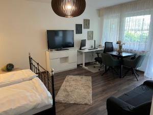 Μια τηλεόραση ή/και κέντρο ψυχαγωγίας στο Wohlfühlen nahe Köln-Messe