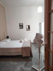 Posteľ alebo postele v izbe v ubytovaní Casa Liolà