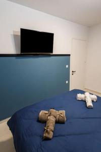 Postel nebo postele na pokoji v ubytování Sunrise Haven Suite