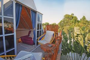 Balkón nebo terasa v ubytování Bungalow Maya en CASA NOMIS CANCUN