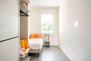 Ένα ή περισσότερα κρεβάτια σε δωμάτιο στο Residence Diamante