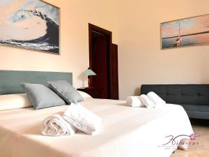 Postel nebo postele na pokoji v ubytování B&B Hibiscus