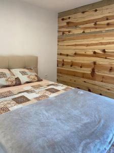 Postel nebo postele na pokoji v ubytování Tiny house Neny Fruška gora
