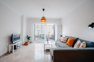 TV a/nebo společenská místnost v ubytování Beach House ELVIRIA