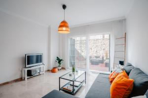 TV a/nebo společenská místnost v ubytování Beach House ELVIRIA