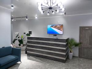 TV a/nebo společenská místnost v ubytování Bagysh Hotel