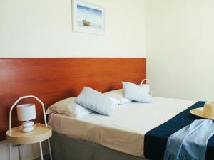Postelja oz. postelje v sobi nastanitve Hotel Panoramico