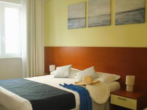 Postelja oz. postelje v sobi nastanitve Hotel Panoramico