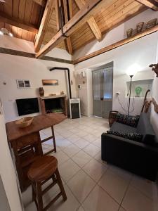 a living room with a couch and a table at Casa Chichina in Guardialfiera