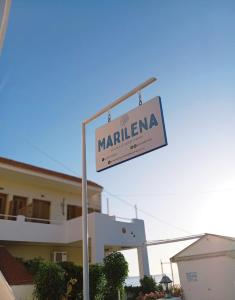 a street sign in front of a building at Marilena in Skala Eresou