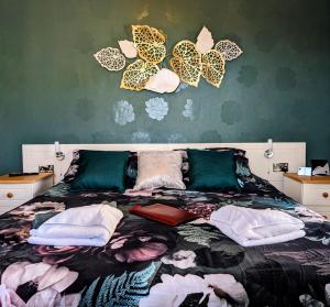 Postel nebo postele na pokoji v ubytování Hambledon Hotel