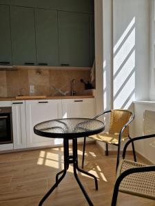 Cuina o zona de cuina de Gîte Des Tables - Cathédrale, Cœur historique, Vue