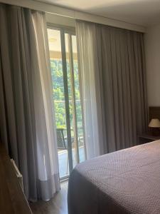 Katil atau katil-katil dalam bilik di Suíte luxo Rio centro