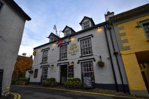 a building with a sign that reads old town pub at Red Lion Inn in Hawkshead