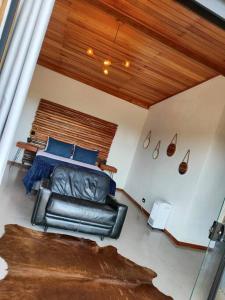 Khu vực ghế ngồi tại Cabanas Refúgio Sete Raios São Thomé das Letras