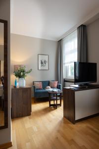 TV a/nebo společenská místnost v ubytování Hotel Haus Delecke