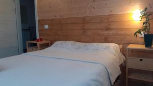 Postel nebo postele na pokoji v ubytování b&b Onda Verde