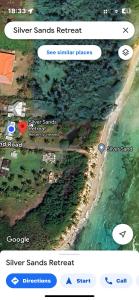 un mapa de una playa con un buscador en Silversands Retreat en Corn Island