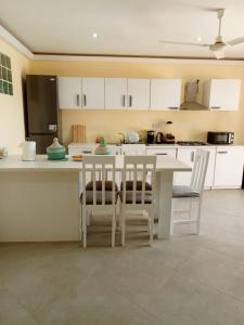 Kuchyň nebo kuchyňský kout v ubytování Bella