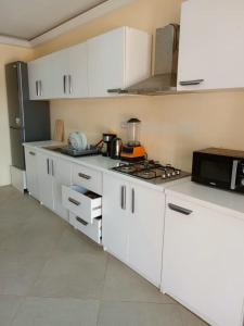 Kuchyň nebo kuchyňský kout v ubytování Bella + 3 fotografie