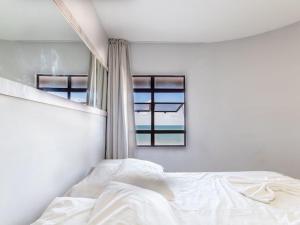 En eller flere senge i et værelse på Elegance flat Natal RN - PLAC + 38 billeder