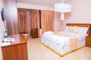 Postel nebo postele na pokoji v ubytování Paleo Hotel and Spa, Thika + 37 fotografií