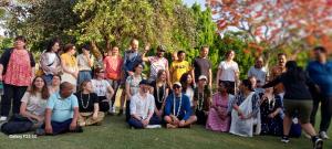 a large group of people posing for a picture at The Lodge B&B in Jaipur