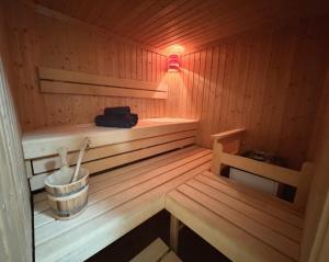 Spa- og/eller wellnessfaciliteter på 5* Panorama Chalet mit Sauna by Belle Stay