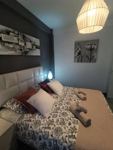 Łóżko lub łóżka w pokoju w obiekcie BEACH&GARDEN