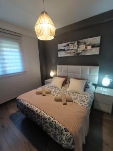 Łóżko lub łóżka w pokoju w obiekcie BEACH&GARDEN