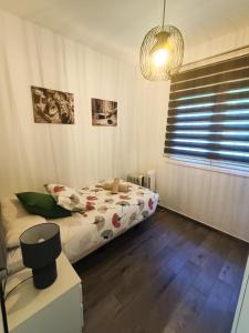 Łóżko lub łóżka w pokoju w obiekcie BEACH&GARDEN