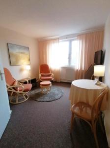 TV a/nebo společenská místnost v ubytování Landhaus Martens