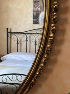Postel nebo postele na pokoji v ubytování Il Podere degli Asinelli