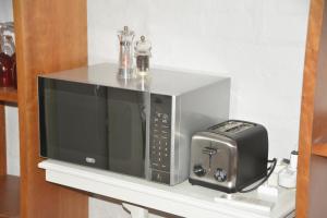 Fotografie z fotogalerie ubytování Pender House Cottage Melrose v destinaci Johannesburg