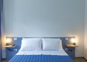 Postel nebo postele na pokoji v ubytování Fresia B&B