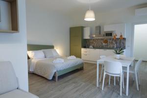 Postel nebo postele na pokoji v ubytování Fresia B&B