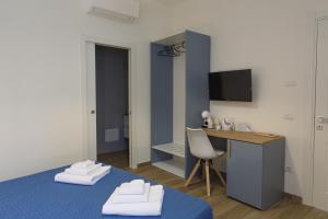 Postel nebo postele na pokoji v ubytování Fresia B&B