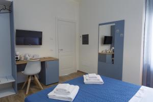 Postel nebo postele na pokoji v ubytování Fresia B&B