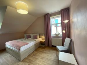 Letto o letti in una camera di Apartmány penzion Jasmín